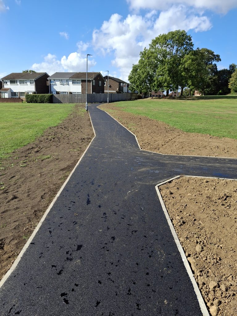 Tarmac surfacing to path across field in Leeds